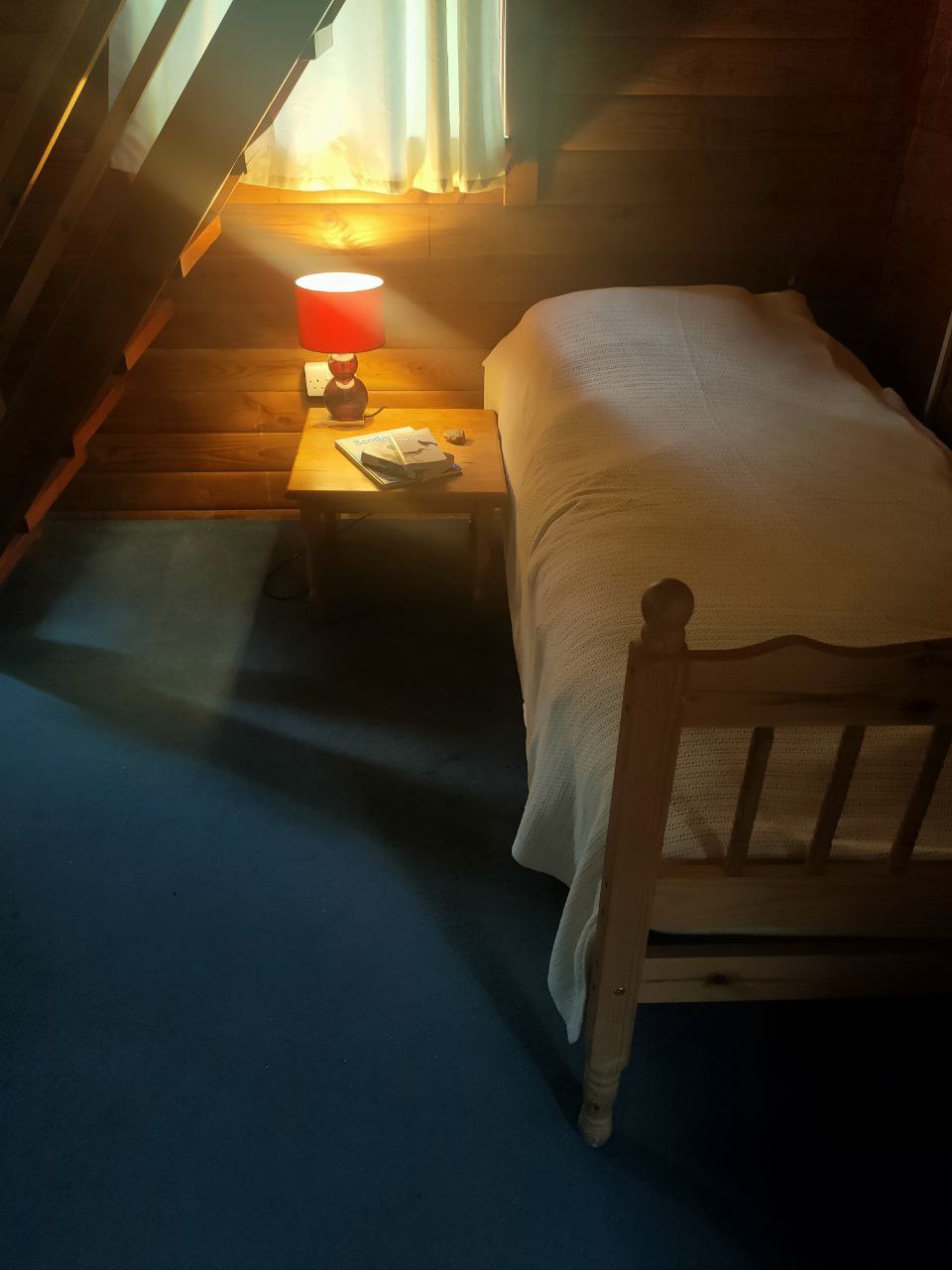 A single bed on the ground floor